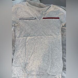 Medium Tommy Hilfiger shirt lightly worn. Gray,red, black and white